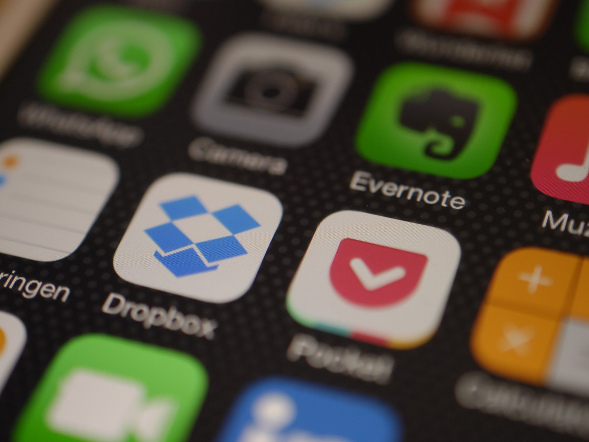 Smartphone screen with apps showcasing digital solutions by a mobile app development company in Kerala