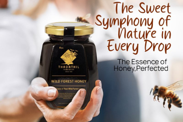 Product advertisement for Thadathil Farm Resort Wild Forest Honey, showing hands holding a glass jar with a black and gold label alongside promotional text and a honeybee graphic.