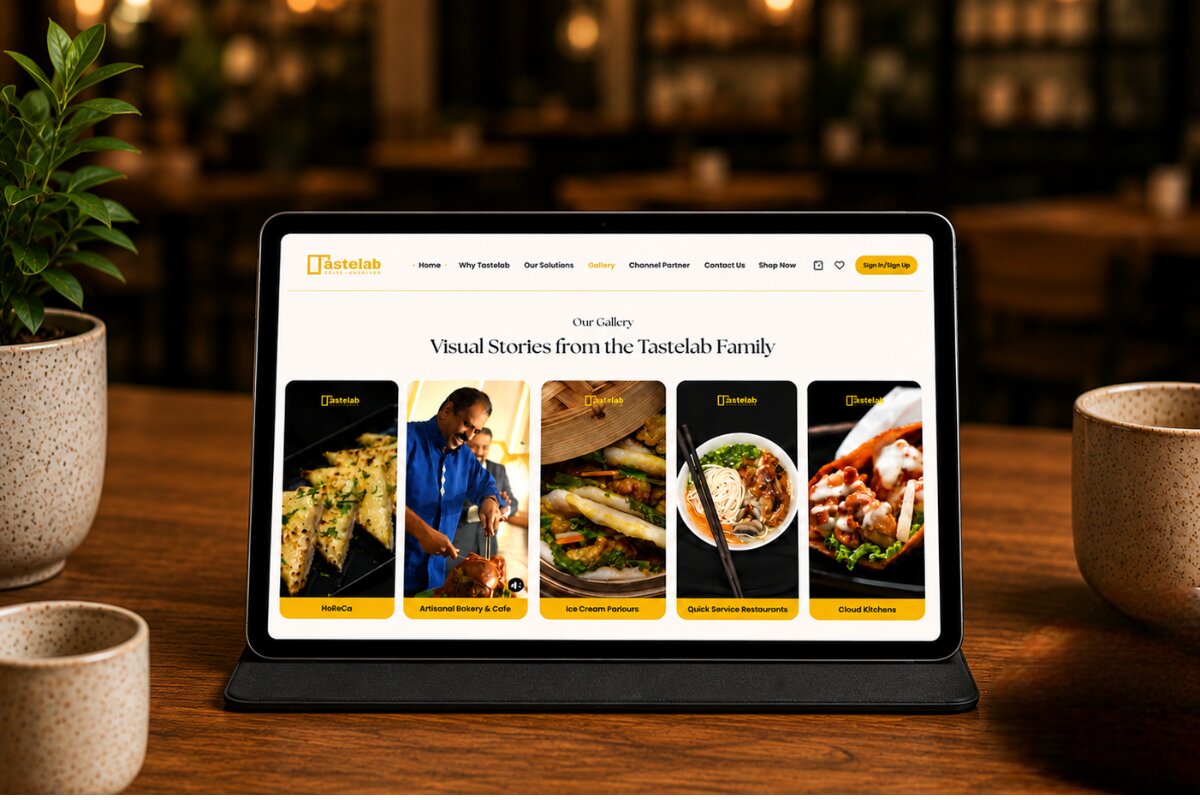 Tablet displaying the Tastelab website gallery, showcasing various culinary service categories.