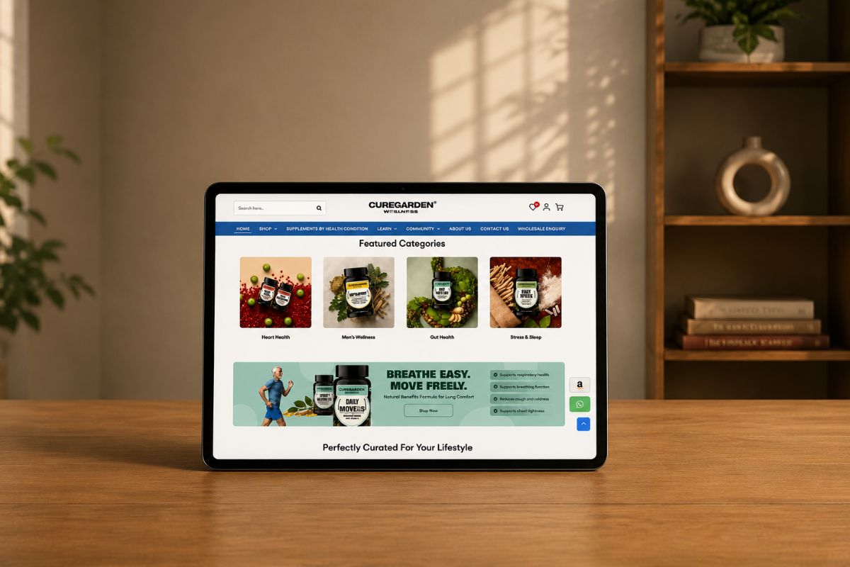 A desktop computer displaying the Curegarden Supplements homepage, featuring a collection of science-backed herbal wellness products.