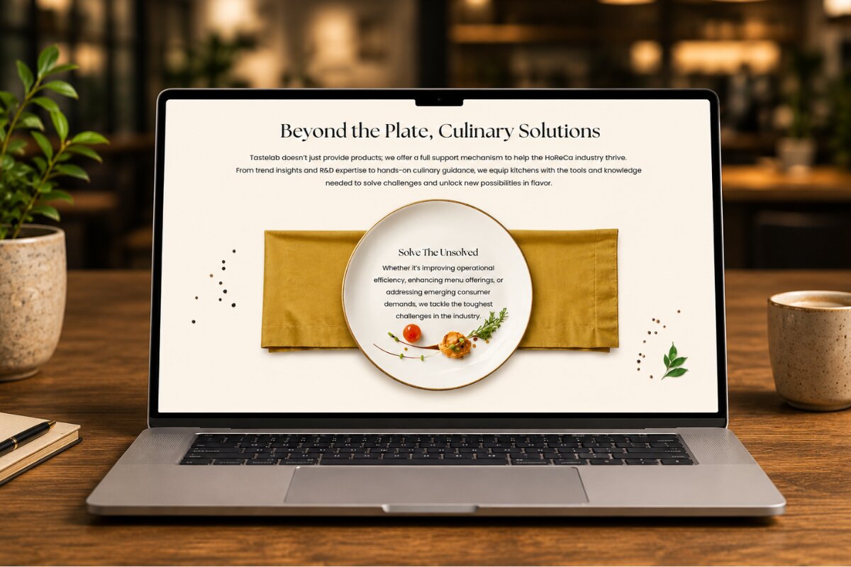 Laptop displaying the Tastelab website, highlighting professional culinary support solutions for the HoReCa industry.