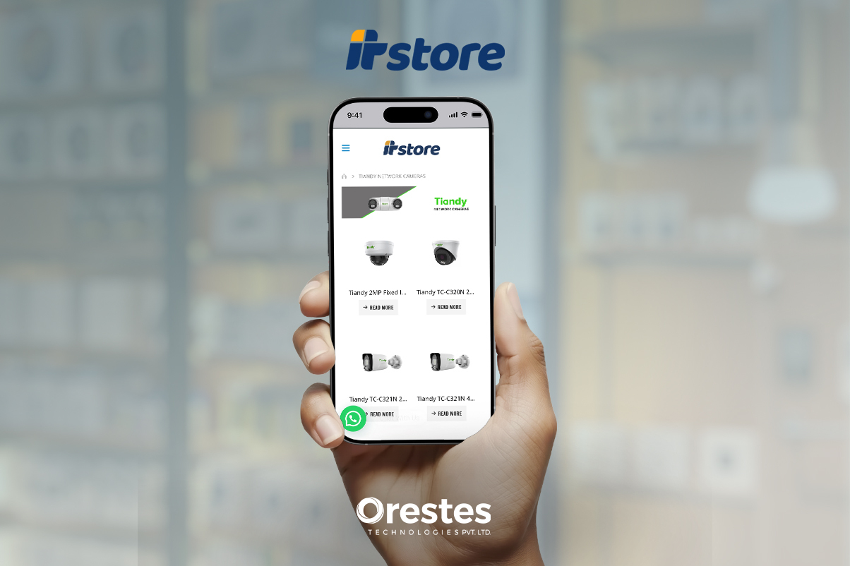 A hand holding a smartphone in a vertical orientation showing a mobile-responsive view of the ITStore website with Tiandy network camera listings.